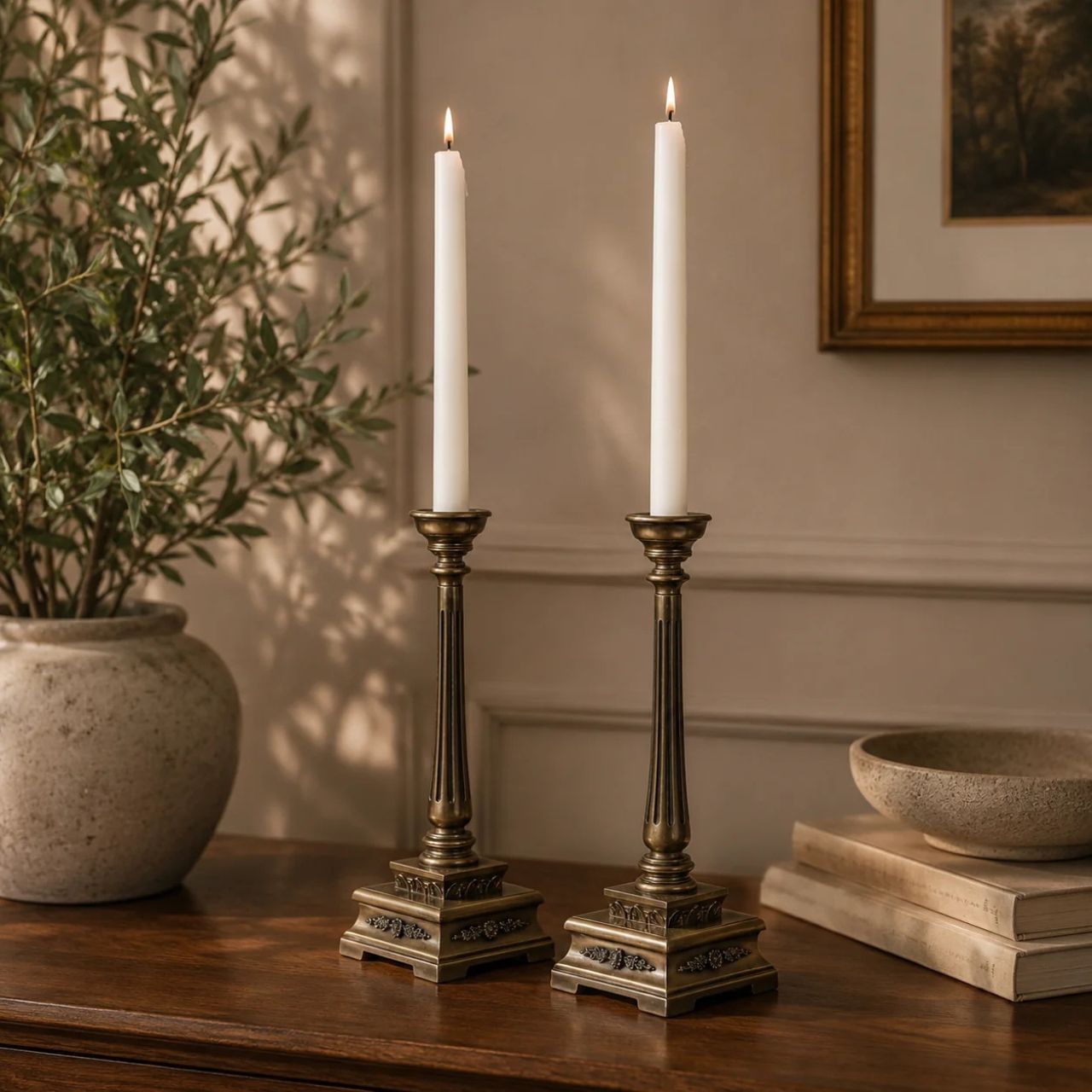 This exquisite duo isn't just an addition to your home; it's a statement of opulence. Meticulously crafted with unparalleled attention to detail, these candle holders exude an aura of unparalleled luxury and refinement. Their presence instantly elevates any setting, be it adorning a mantle, or console, or gracing a lavish dining table.