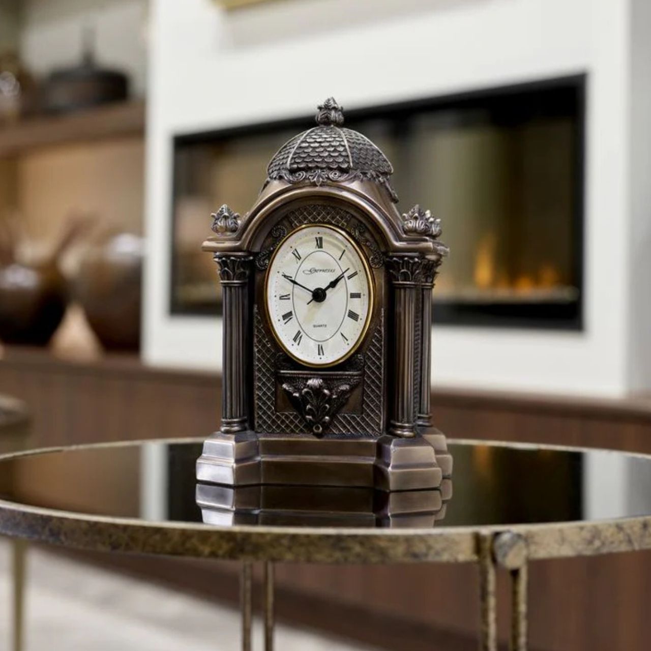 This small mantle clock looks great as a center&nbsp;piece with its beautiful delicate detailing on front and back. Suitable gift for any occasion.&nbsp;