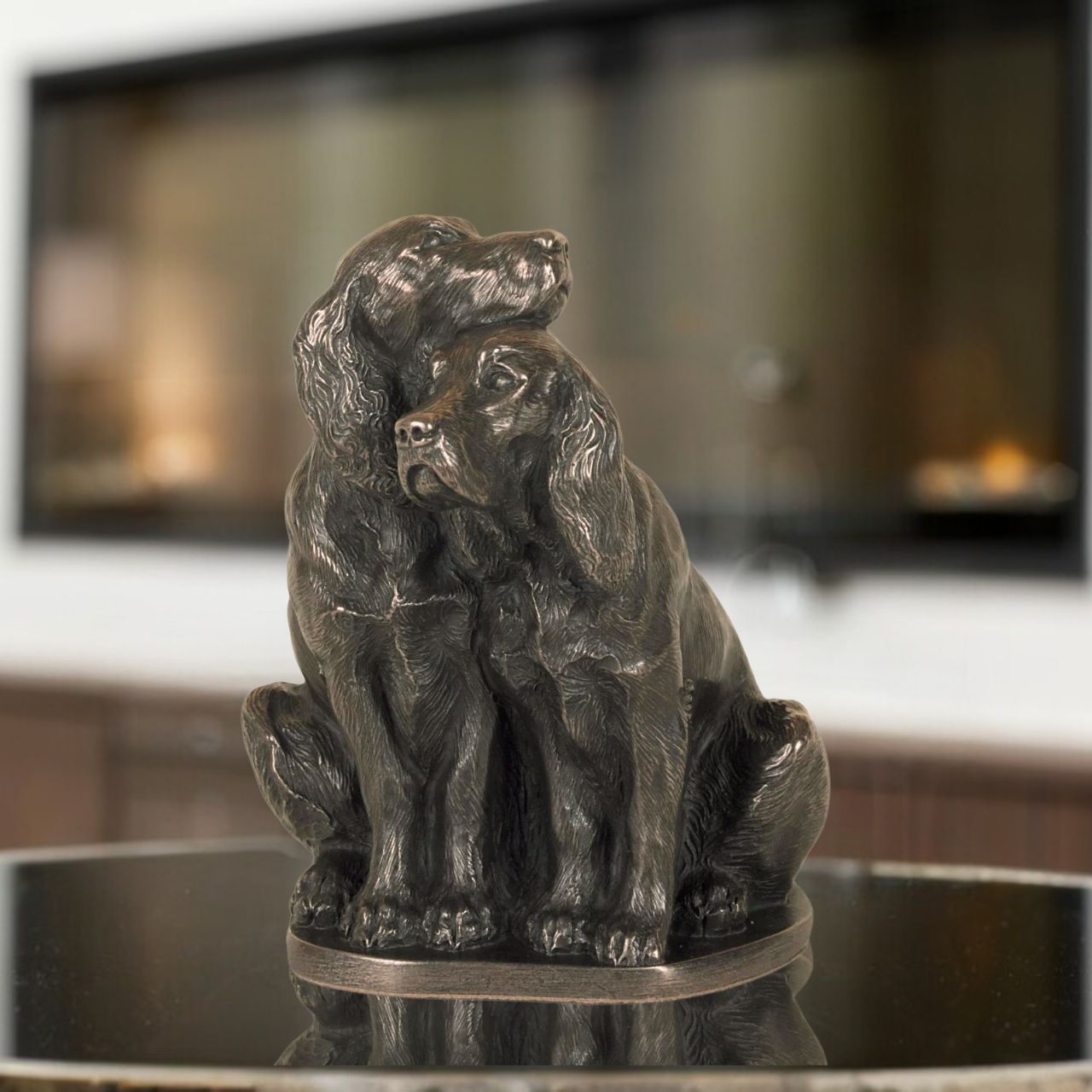 Genesis Pair of Spaniels  A beautiful piece of bronze sculpture depicting a pair of Spaniels  Genesis Fine Arts has evolved into a much loved and world famous Irish brand to produce a striking range of handcrafted cold cast bronze sculptures.