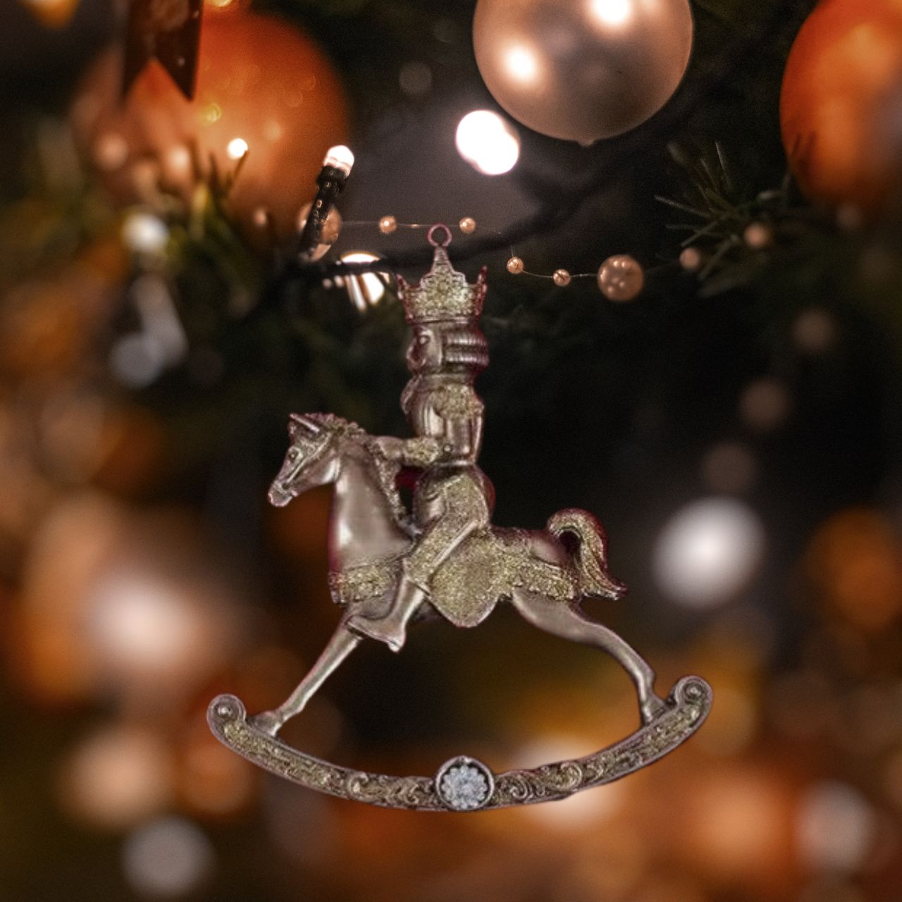 Rocking Horse Christmas Tree Ornament by Genesis  Gorgeous bronze coloured Christmas tree ornament by Genesis Ireland. With glittering gold accents, this ornament is sure to bring a sparkle to your Christmas décor.