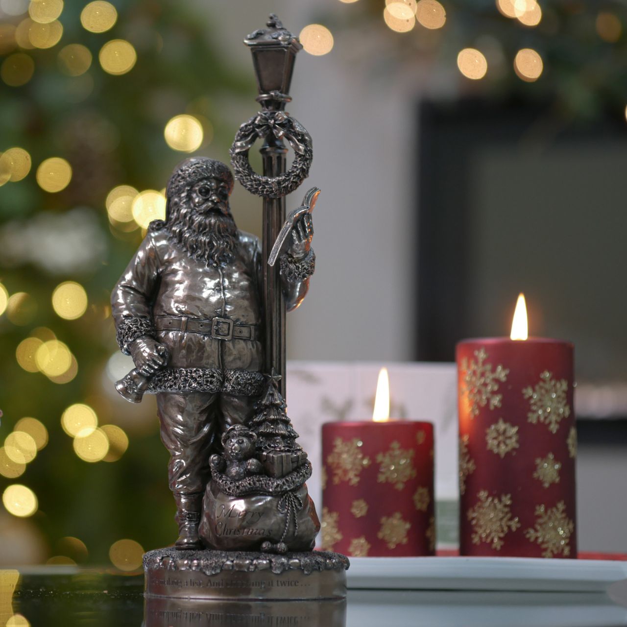 Genesis Ireland Santa's Check List  A stunning ornament that is sure to bring festive cheer to your home, beautiful bronze coloured Christmas decoration, by Genesis Ireland.
