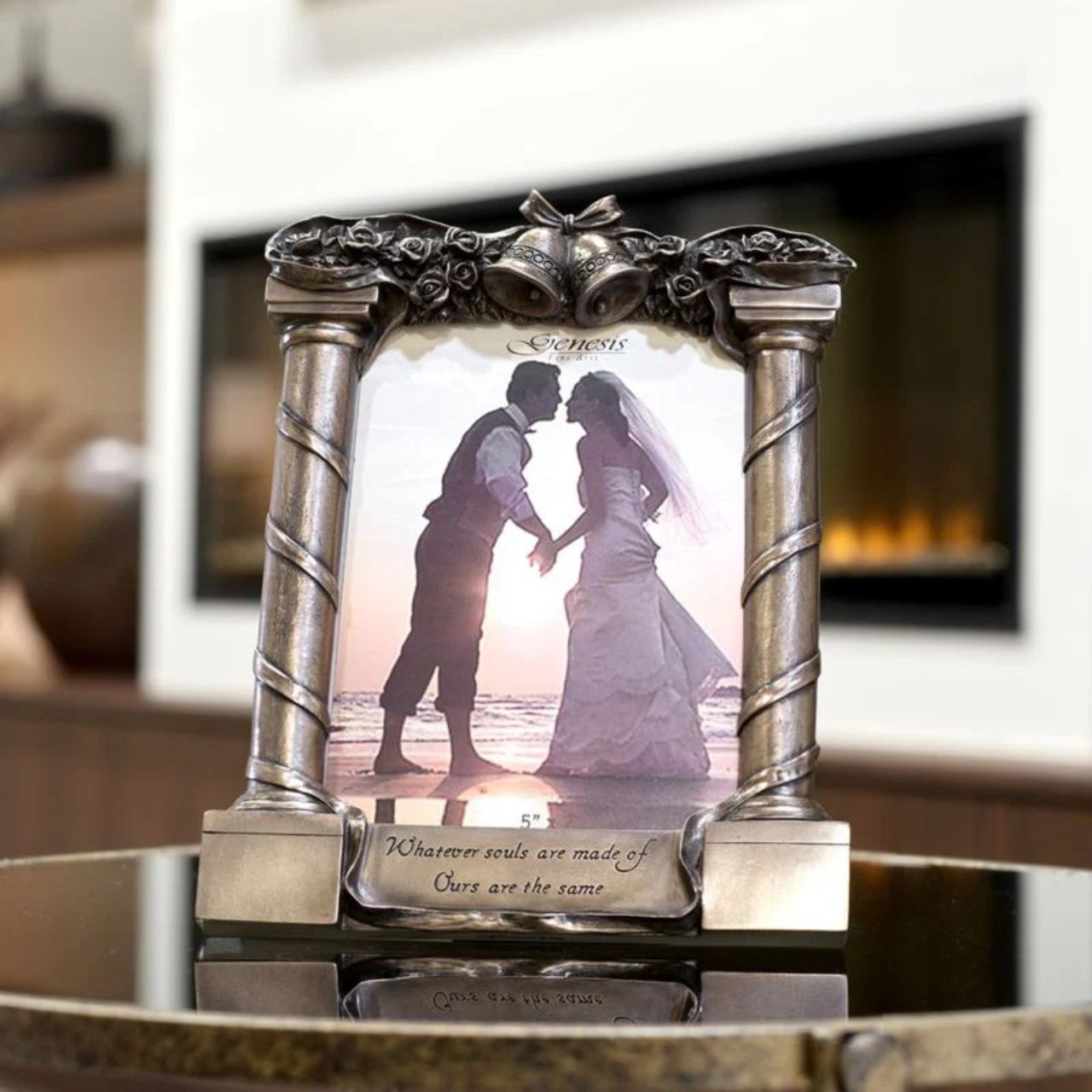Wedding Frame which reads “Whatever souls are made of ours are the same”