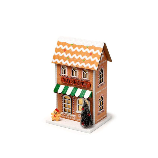 The Gingerbread Toy Shoppe Christmas House LED Decoration brings elegant holiday charm to your home. Featuring warm LED lighting, this finely detailed piece captures the nostalgic spirit of a festive toy shoppe, perfect for creating a refined seasonal ambiance.