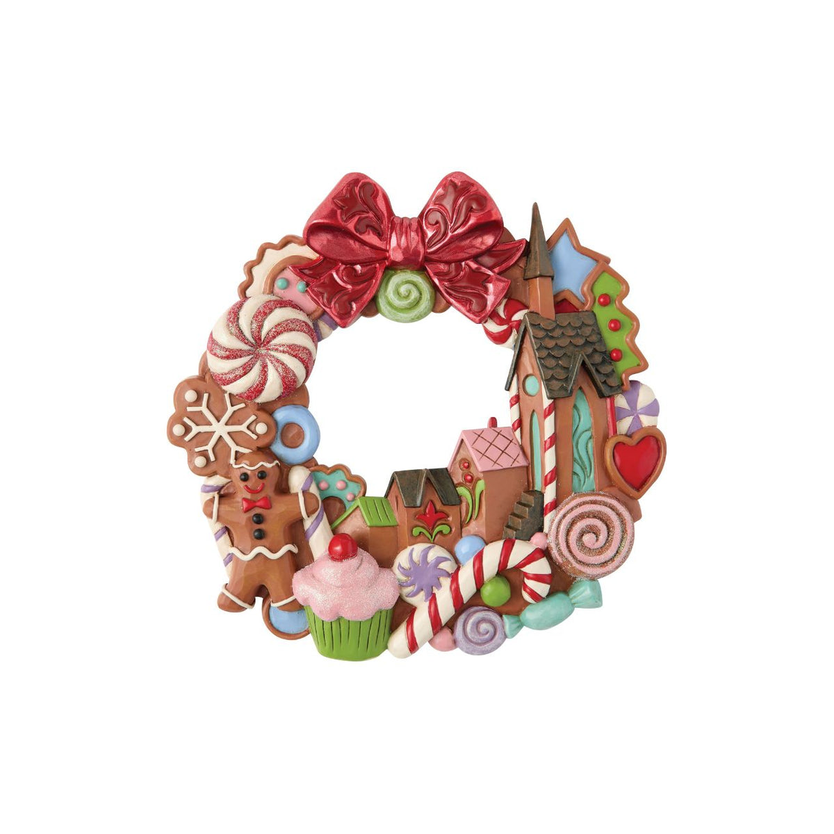 Decorated with candy accents, this wreath is bursting with holiday sweetness. Jim Shore's folk patterns swirl through the design, making it a joyful treat for the eyes. A deliciously fun way to welcome the season and family into your home.