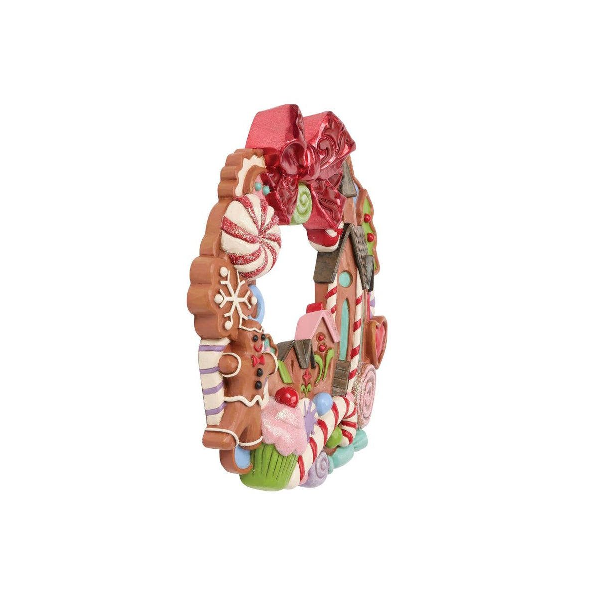 Decorated with candy accents, this wreath is bursting with holiday sweetness. Jim Shore's folk patterns swirl through the design, making it a joyful treat for the eyes. A deliciously fun way to welcome the season and family into your home.