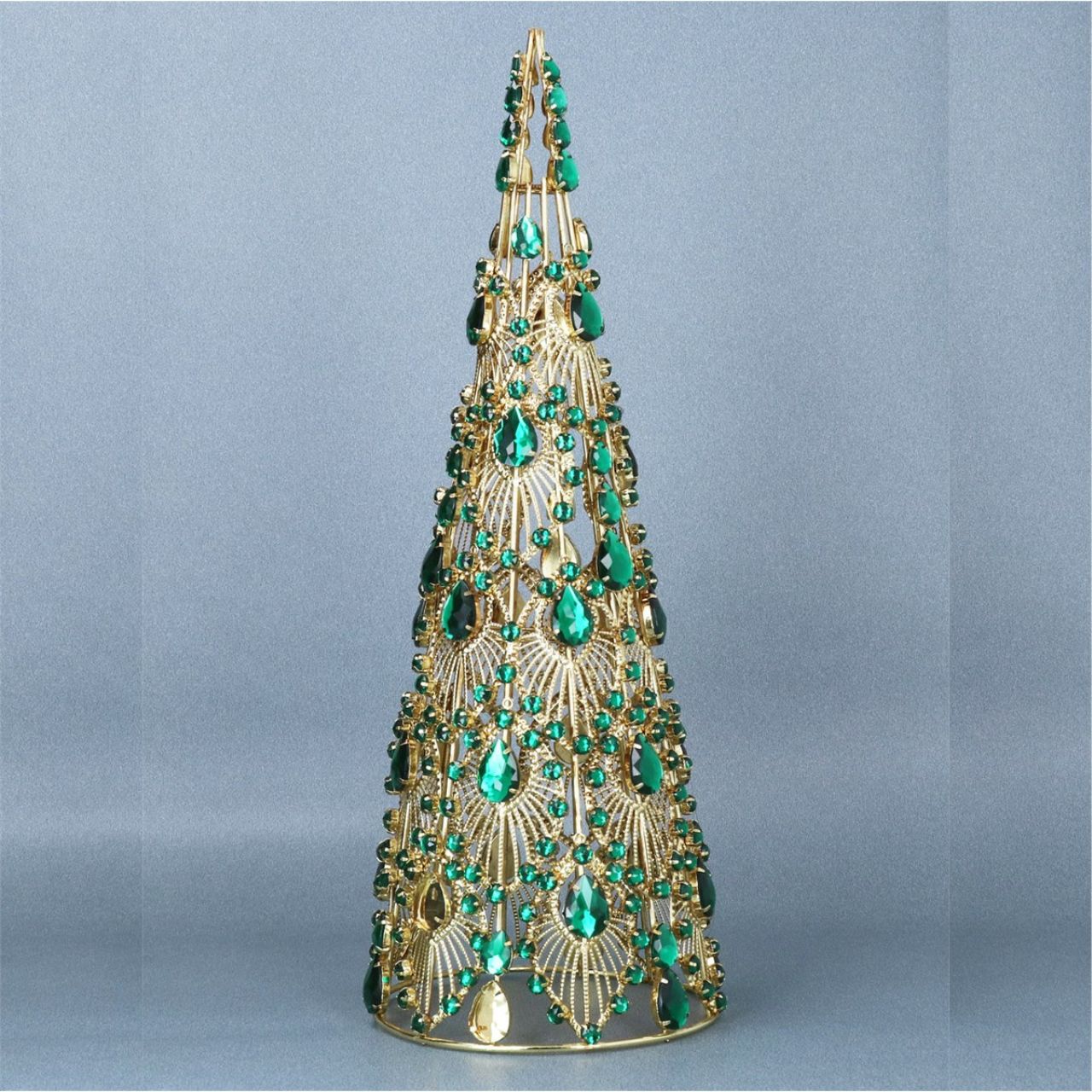 Elevate your holiday décor with the Gisela Graham Gold Christmas Tree adorned with a striking green jewel. This elegant piece combines shimmering gold tones with a rich green accent, adding a refined touch to any festive setting. Perfect for those seeking a sophisticated and timeless Christmas aesthetic, it brings warmth and subtle luxury to your seasonal display.