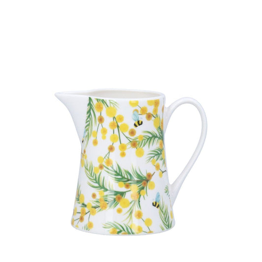 Bring timeless elegance to your table with this charming Mimosa jug from Gisela Graham. Crafted from premium new bone china, this 10cm piece combines durability with refined style, perfect for serving beverages or displaying fresh flowers.