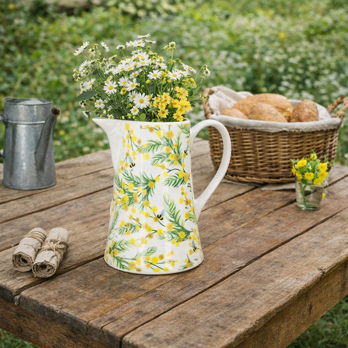 Bring timeless elegance to your table with this charming Mimosa jug from Gisela Graham. Crafted from premium new bone china, this 15cm piece combines durability with refined style, perfect for serving beverages or displaying fresh flowers.