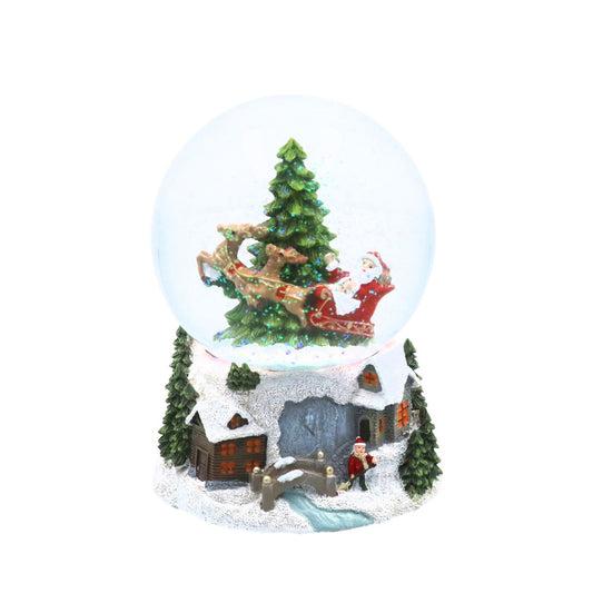 Experience holiday elegance with the Gisela Graham Santa Fling in Sleigh Musical Snow Globe. This beautifully crafted piece captures Santa joyfully sailing through the snow in his sleigh, accompanied by a delicate musical melody.
