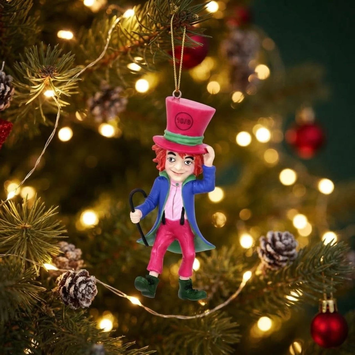 Add a touch of whimsy to your Christmas tree with this charming Mad Hatter hanging decoration by Gisela Graham. Crafted from quality resin, this delightful ornament features an iconic storybook Mad Hatter — perfect for Alice in Wonderland enthusiasts and collectors alike.