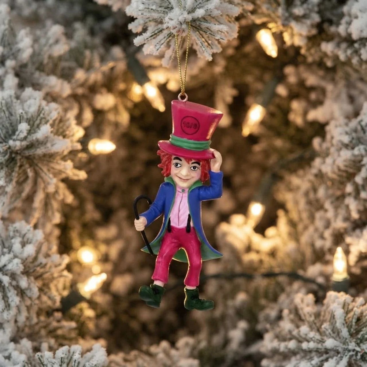 Add a touch of whimsy to your Christmas tree with this charming Mad Hatter hanging decoration by Gisela Graham. Crafted from quality resin, this delightful ornament features an iconic storybook Mad Hatter — perfect for Alice in Wonderland enthusiasts and collectors alike.