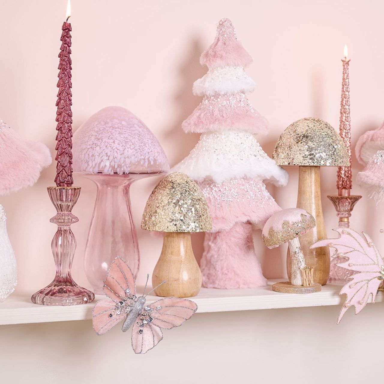 Light up your home with elegance with the Pink Candle Holder. This stunning glass candle holder features a graceful pink hue reminiscent of blooming peonies, evoking a sense of romance and sophisticated style.