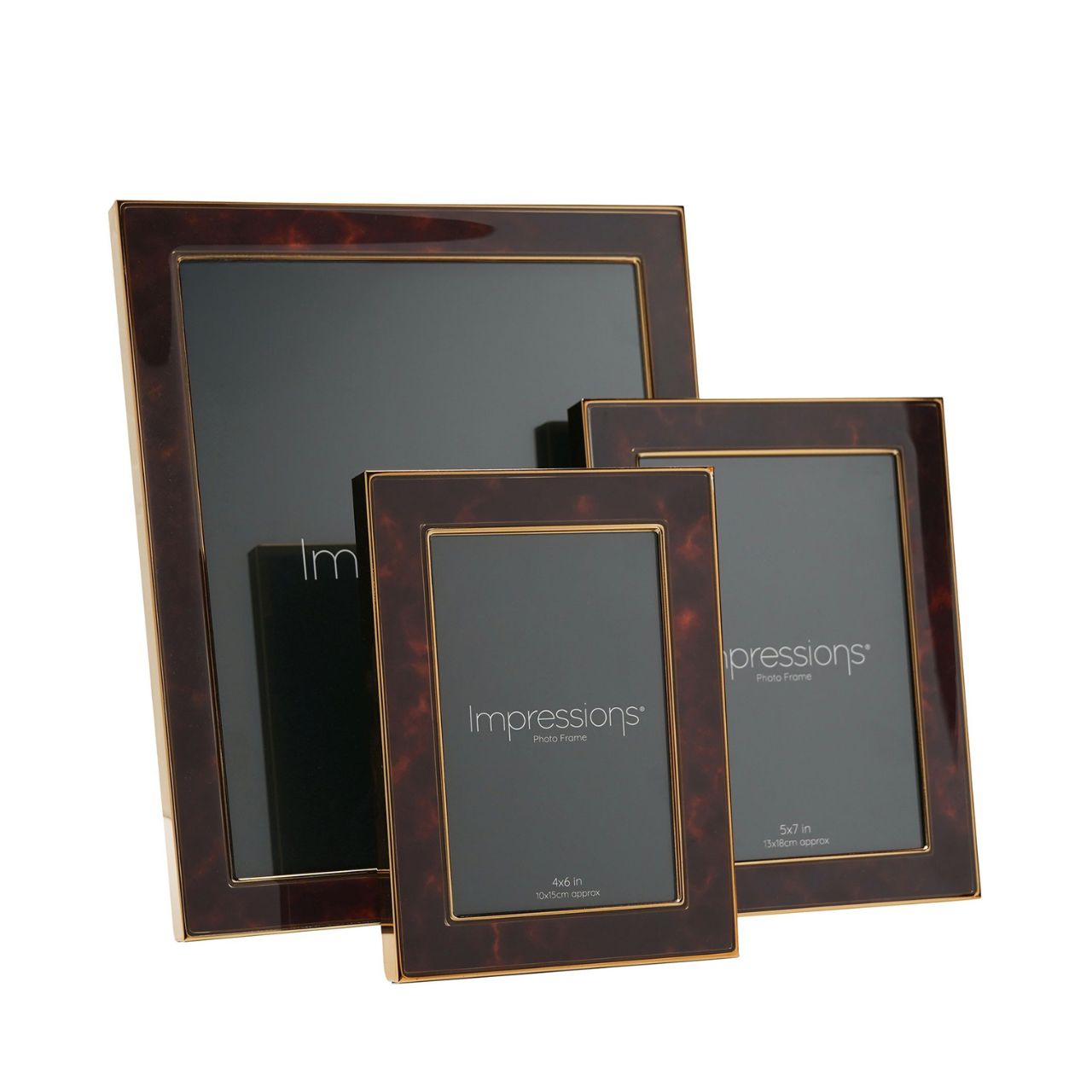 The Impressions Gold Tone Photo Frame 8" x 10" offers a stunning showcase for photographs or artwork.