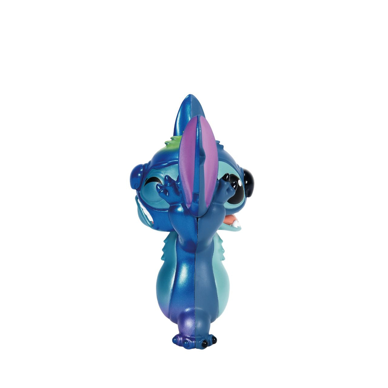 See both sides of Stitch with this double faced figurine. Featuring his happy, mischievous side in his trademark blue, and then on the other, a more pearlescent version of Stitch with a sad face.