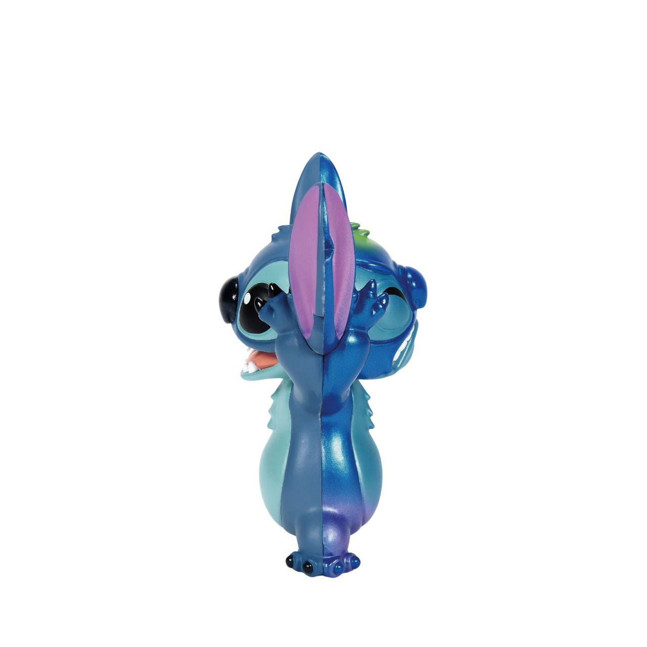 See both sides of Stitch with this double faced figurine. Featuring his happy, mischievous side in his trademark blue, and then on the other, a more pearlescent version of Stitch with a sad face.