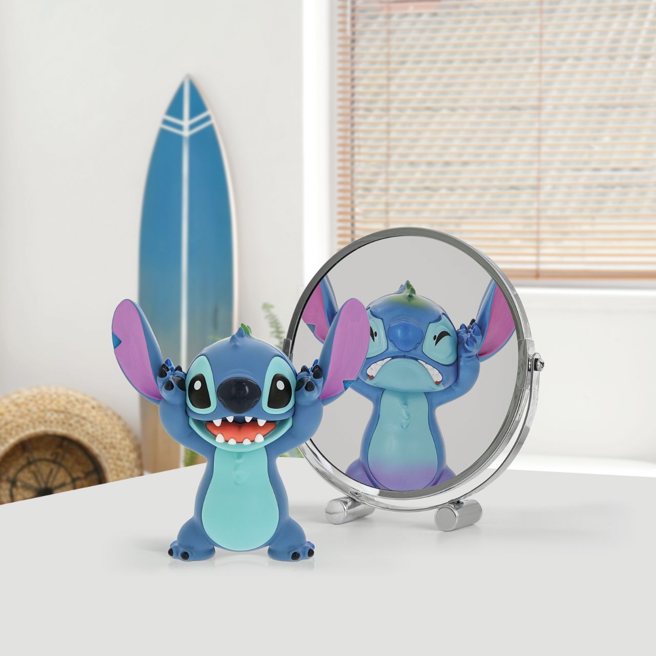 See both sides of Stitch with this double faced figurine. Featuring his happy, mischievous side in his trademark blue, and then on the other, a more pearlescent version of Stitch with a sad face.