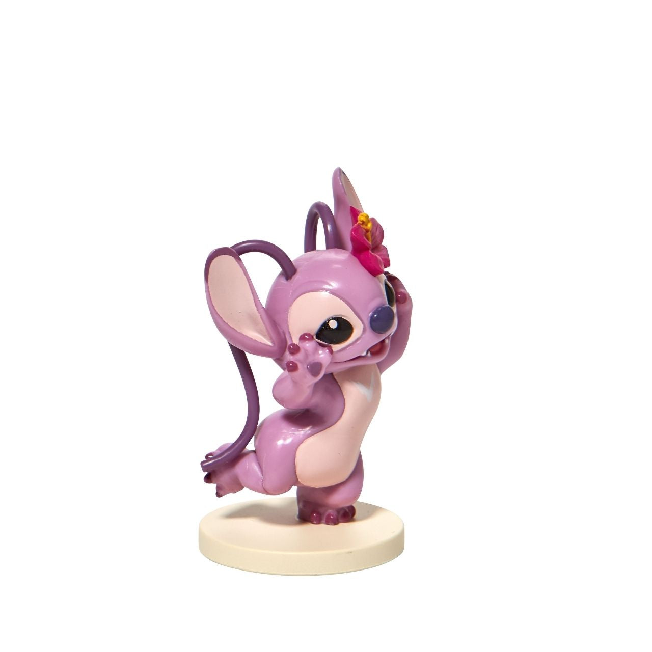 Moulded from high quality vinyl, this super-cute mini Angel has a sweet flower tucked behind her ear and is ready for a party.