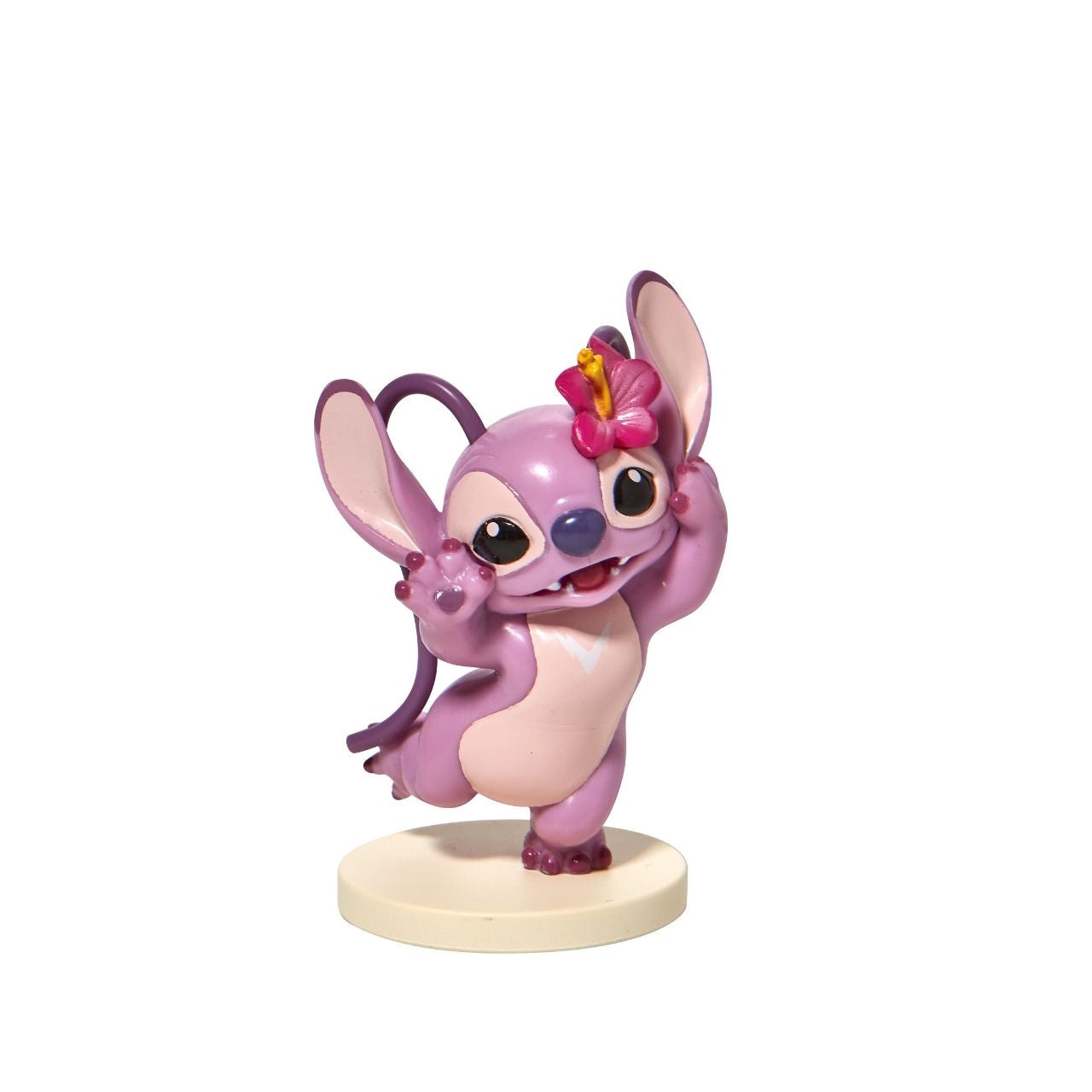Moulded from high quality vinyl, this super-cute mini Angel has a sweet flower tucked behind her ear and is ready for a party. 