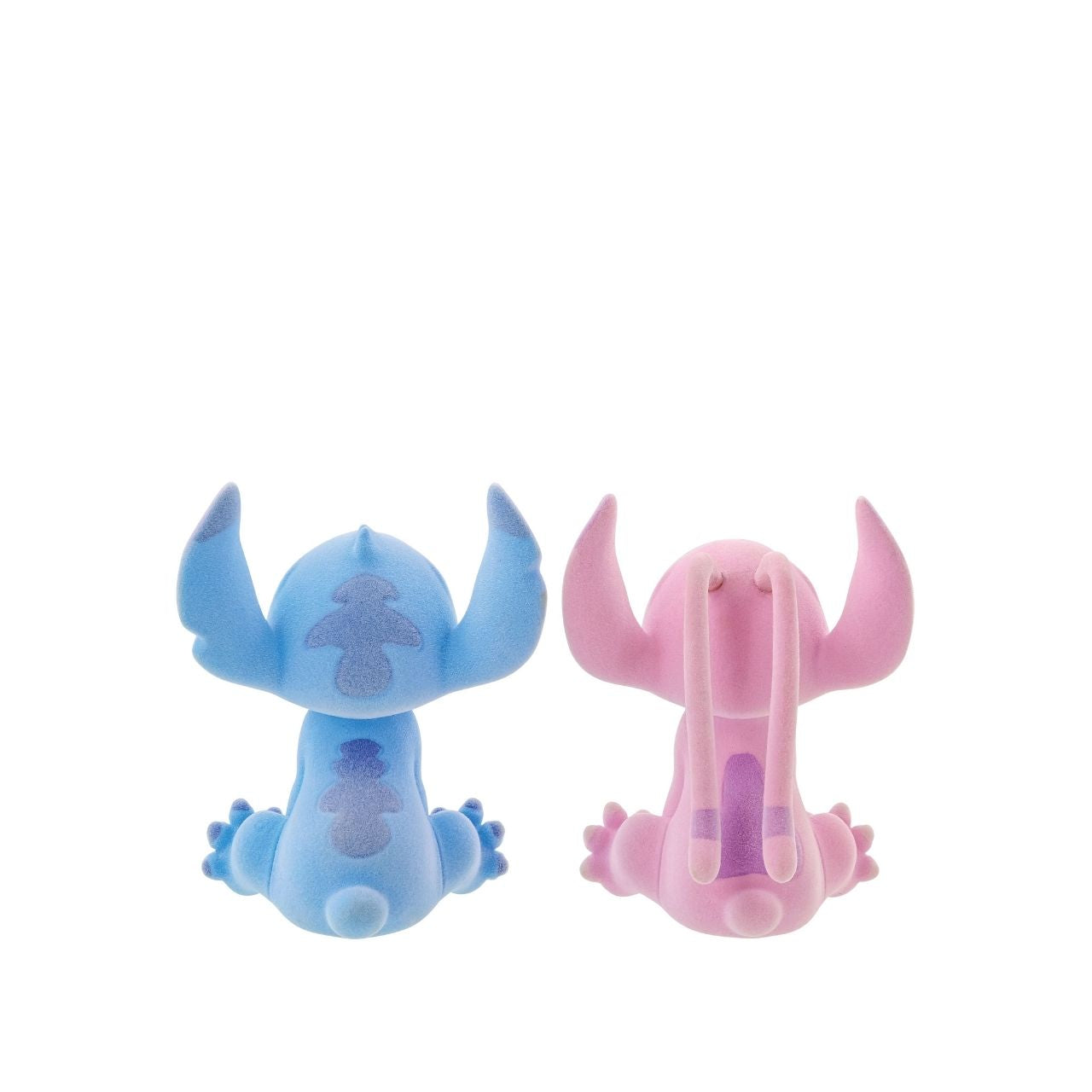 This dynamic duo are together again in this super cute flocked figurine pair. With magnets in their noses to pull them together, they look like they are having a sweet eskimo kiss.