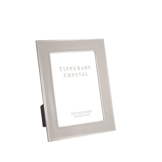This Tipperary Grey Enamel Frame, measuring 4" x 6", features a sleek grey enamel finish complemented by refined silver edging. Its durable construction ensures long-lasting display of your cherished photographs, while the elegant design adds a sophisticated touch to any room or office setting.