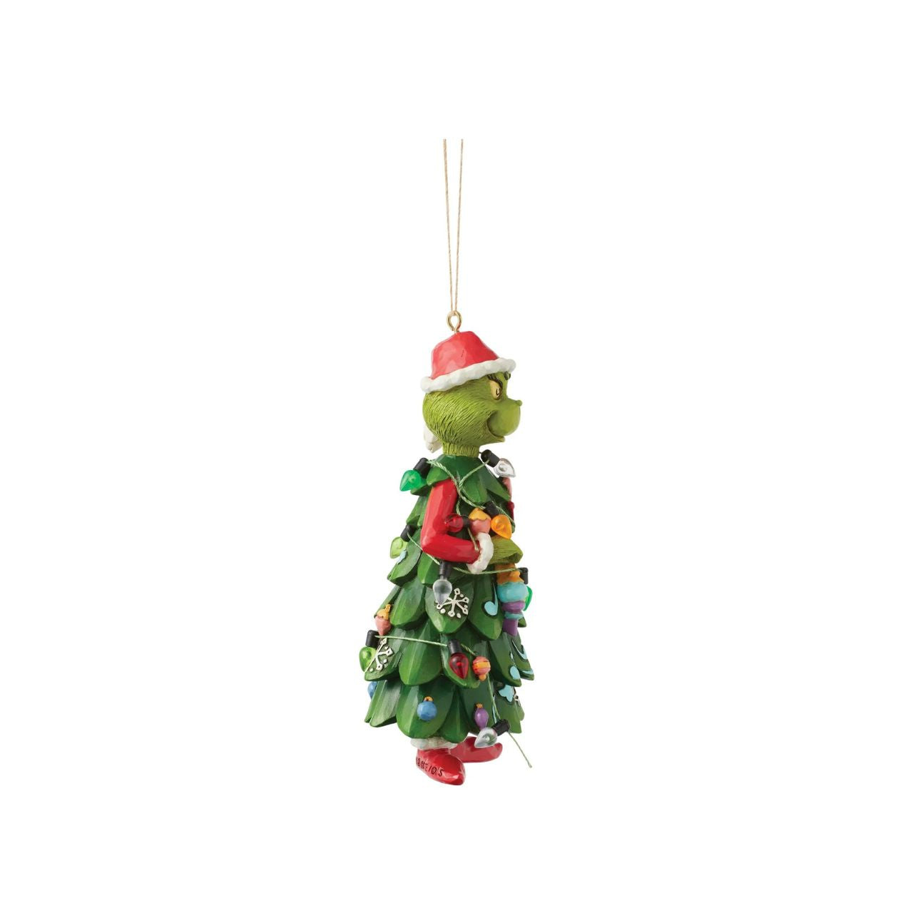 Dressed as a Christmas tree, the Grinch holds an ornament, mischievously decorating himself in this playful Jim Shore design.