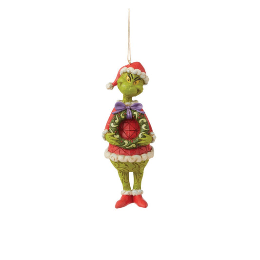 Grinch with Wreath Hanging Ornament  A perfect addition to any Christmas tree, this intricate Jim Shore bauble features The Grinch dressed as Santa. Holding a wreath between his conniving claws, his smile is closer to a sneer as he plots his next theft from your tree.