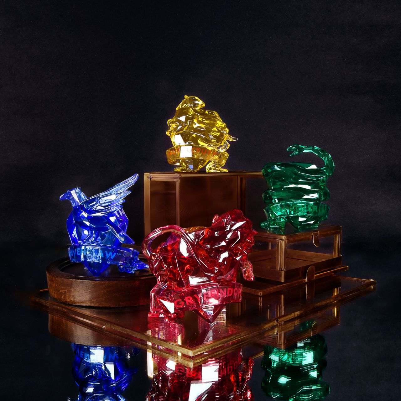 This "gem-cut" acrylic sculpture reflects the iconic Gryffindor House Logo.