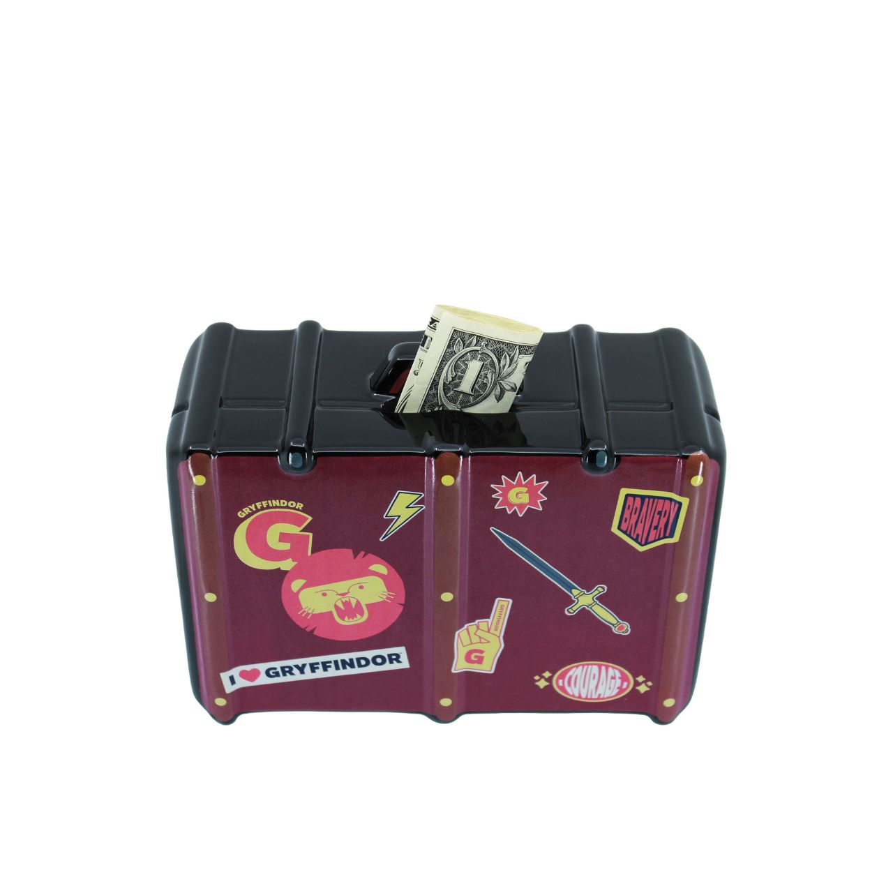 A novelty Gryffindor-themed money box designed to look like a vintage treasure chest, featuring a dark red and black body with various themed stickers and a slot on top for inserting cash.