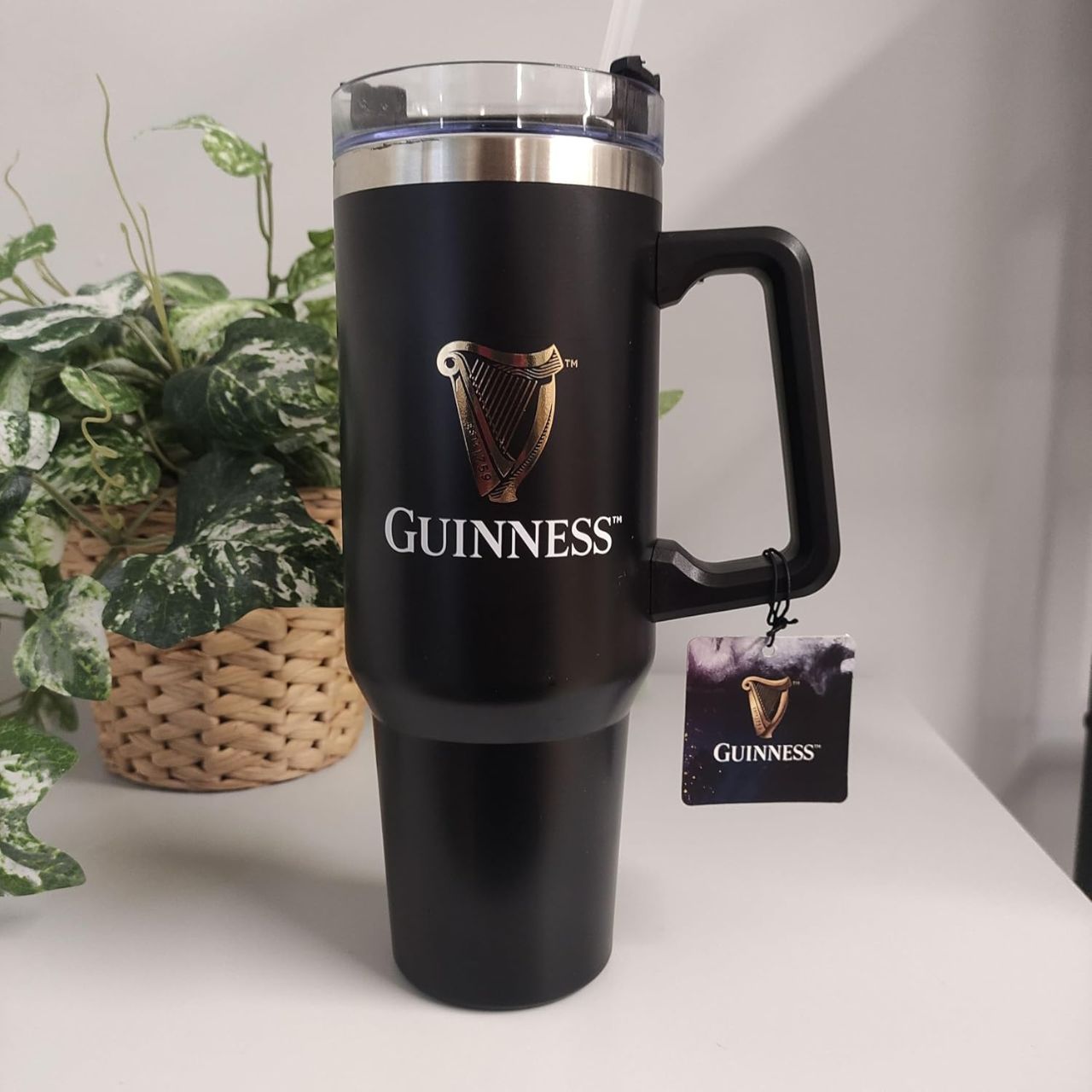 Premium travel cup featuring the iconic Guinness harp logo, celebrating the heritage of Ireland's beloved stout.