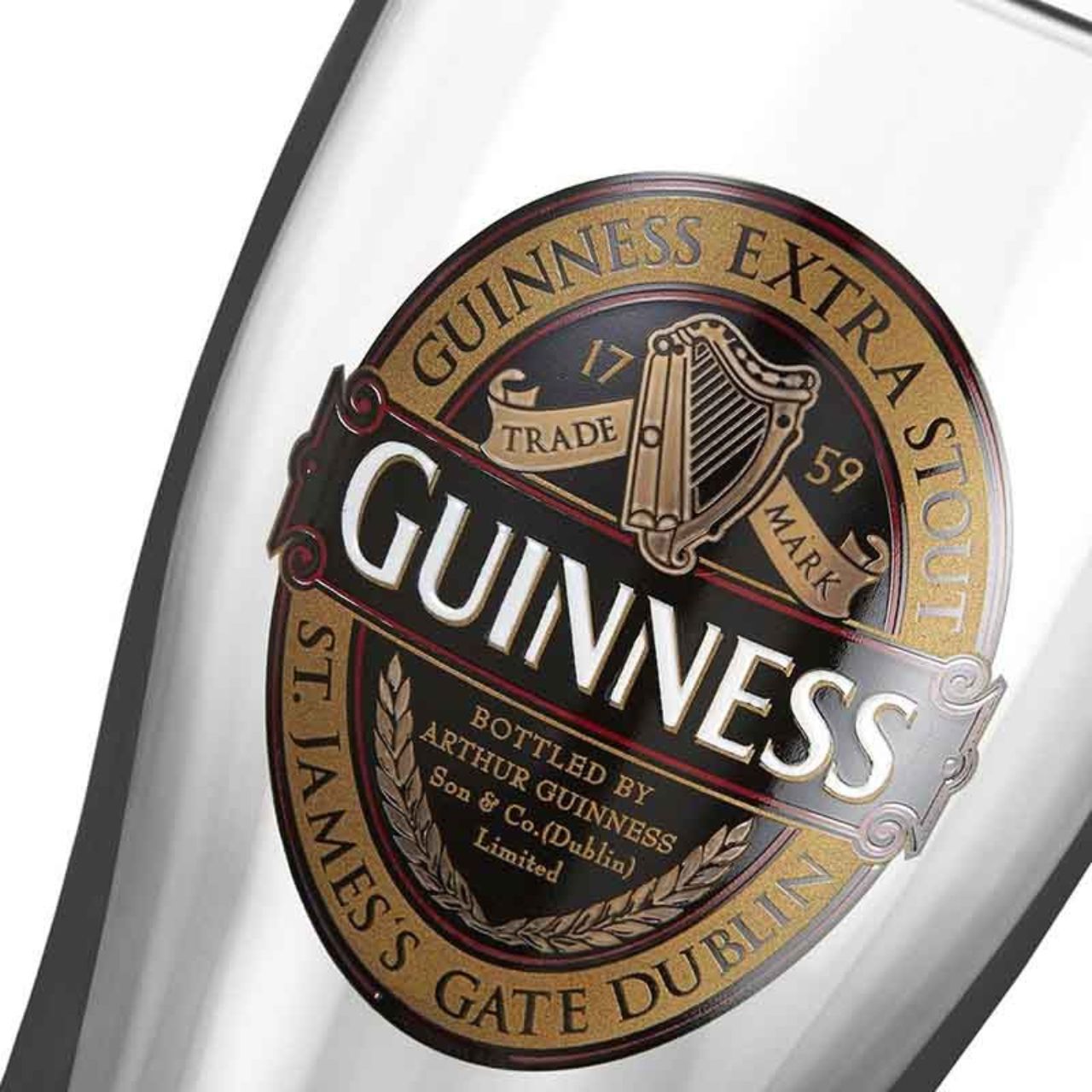 Enjoy your next pint of Guinness with lively ruby red vibes with this Guinness Ruby Red Pint Glass! This pint-sized glass come in a classically elegant, tulip-shaped silhouette, with a base neck that is narrow and gradually flares up to the brim in an elongated bulbous shape. On the front of each glass is a recreation of the Guinness Extra Stout bottle label in a radiant gold and ruby red color scheme.