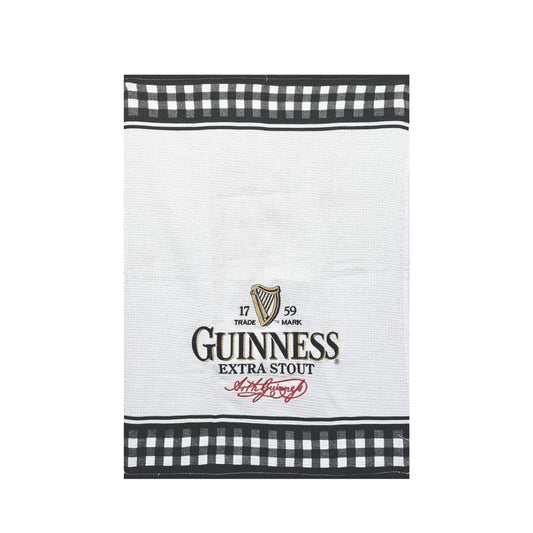 Celebrate the rich heritage of Ireland's most iconic stout with this stylish Guinness Extra Stout Waffle Tea Towel from the official Guinness Collection