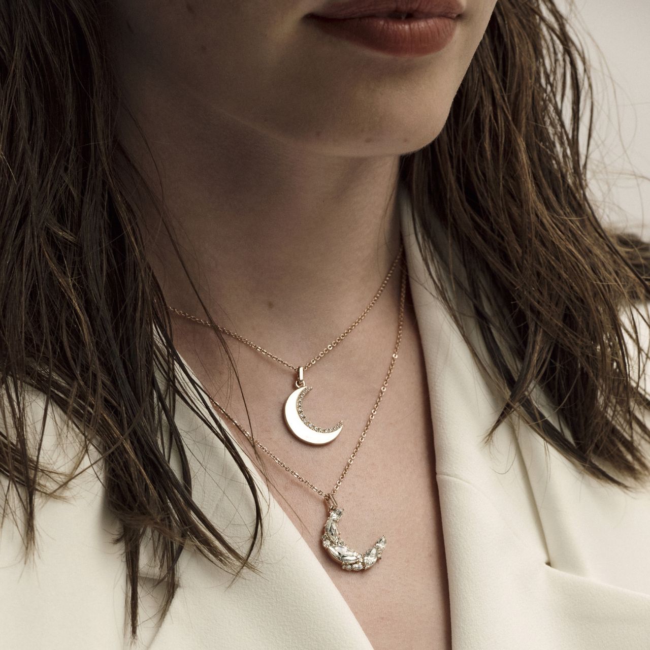 Half Moon Rose Gold Pendant by Tipperary Crystal  Inspired by the hypnotic energy of the glowing moon, this collection is contemporary and minimalist yet luxuriously adorned with the clearest sparkling stones.