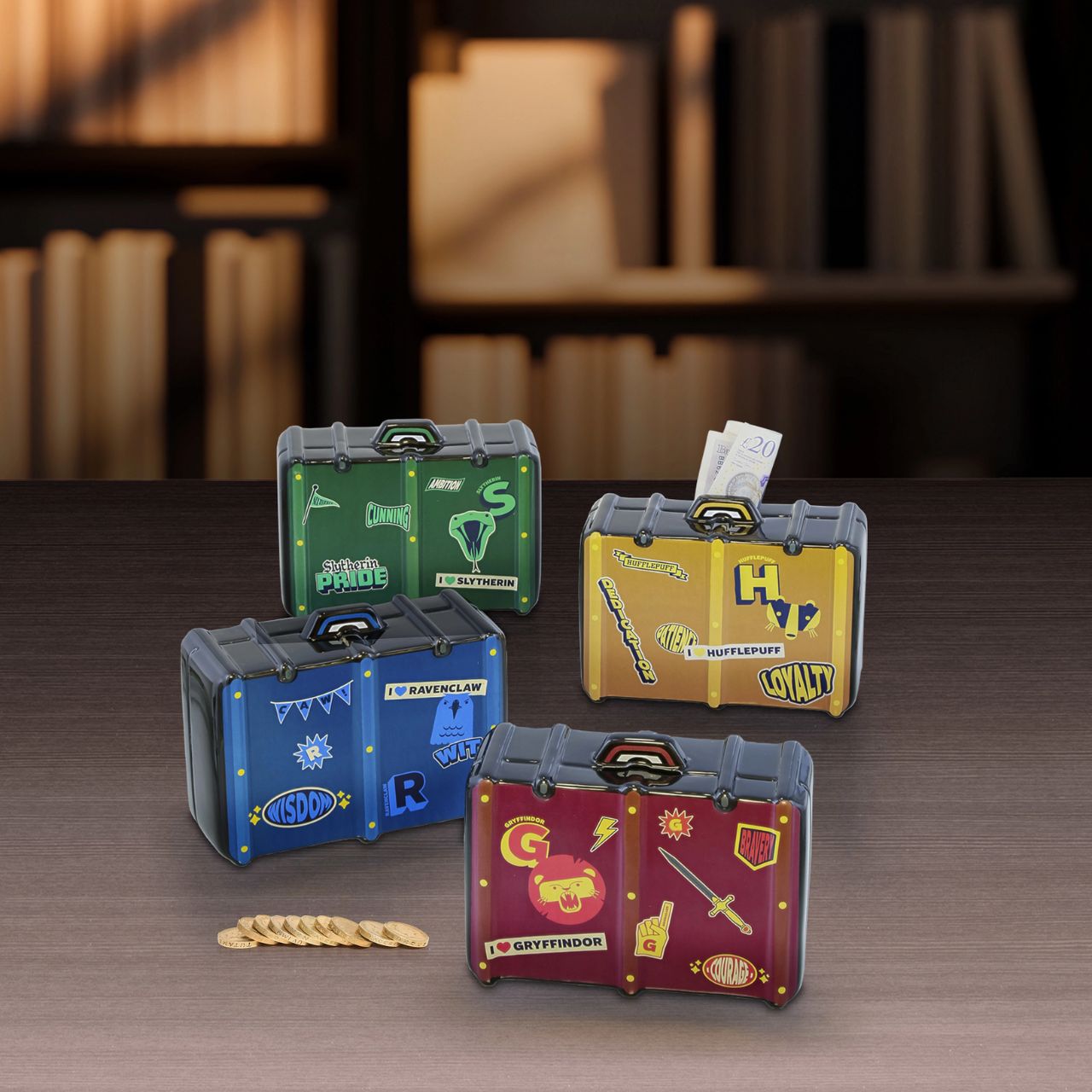 Show your house pride with the Gryffindor luggage ceramic bank. All decked out with badges and decals that show Gryffindor is number one. Rubber seal gasket keeps coins safe.