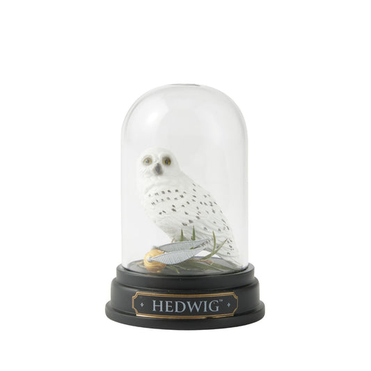 Owl enthusiasts and Harry Potter fans alike will be mesmerized by this graceful, sculpted and hand-painted miniature rendition of Harry's loyal companion nestled under a glass dome.
