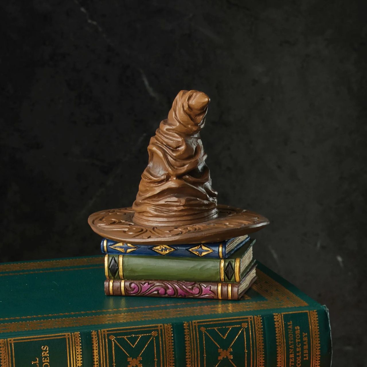 Launched January 2025, the Harry Potter by Jim Shore collection brings the iconic characters from the film franchise to life in a whole new way. Hand carved and painted in high quality cast stone, the Mini Sorting Hat is the perfect addition to any collection.