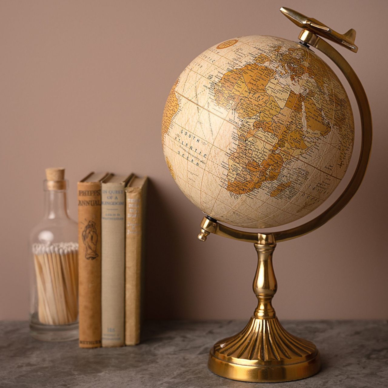 This classic globe would make a perfect gift or decorative item.