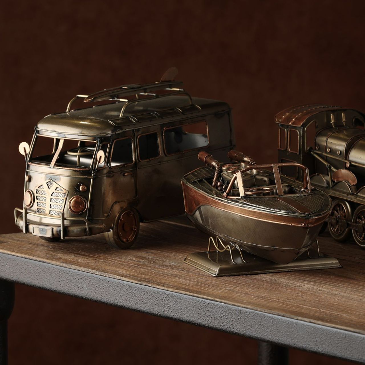 Introduce a touch of vintage charm to any space with the Harvey Makin Campervan Ornament. This delightful model, styled as a classic van, exudes a nostalgic, laid-back vibe, perfect for those who love a retro aesthetic or dream of coastal adventures.
