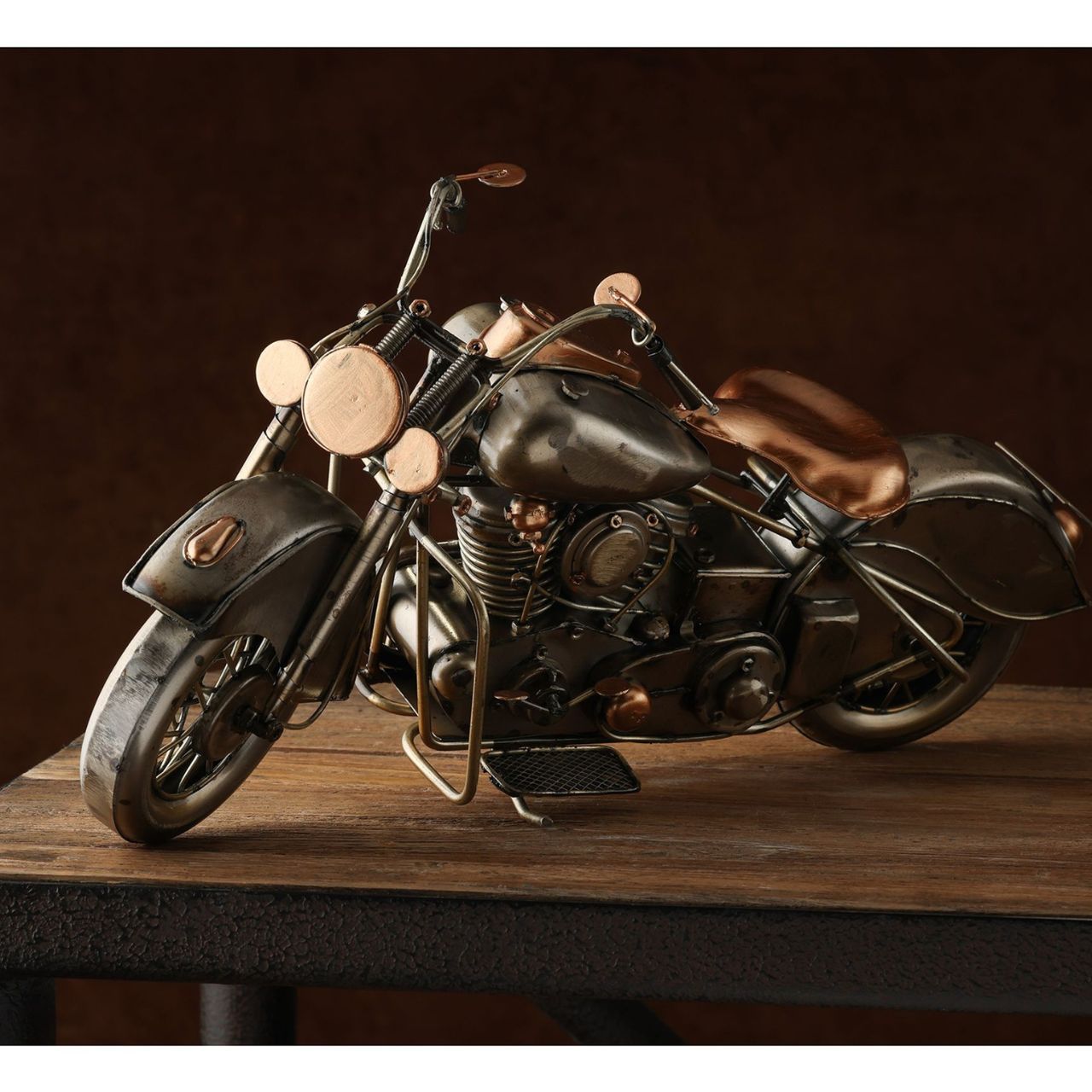 Invoke the spirit of the open road with the Harvey Makin Motorbike Ornament. Inspired by vintage designs, this piece exudes a rugged charm sure to captivate any motorbike enthusiast or collector of unique keepsakes.