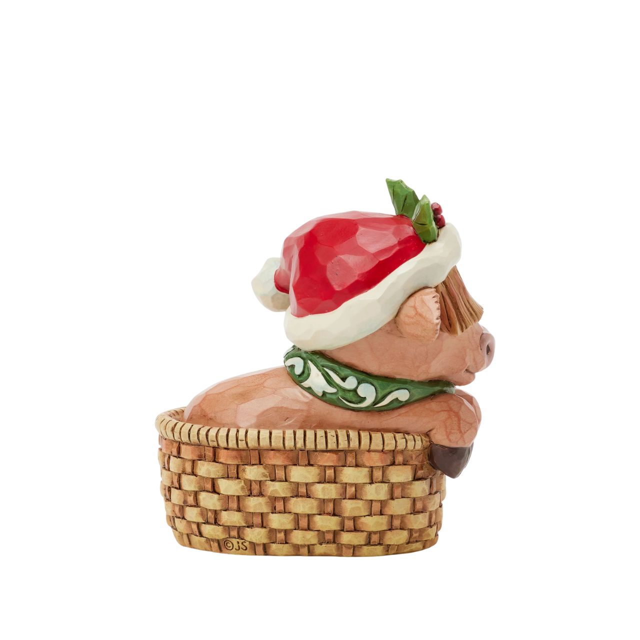 This adorable Jim Shore highland cow miniature radiates holiday cheer from within a cozy basket adorned with a festive bow. Dressed in a cheerful scarf and a Santa hat trimmed with holly, this delightful piece brings warmth and whimsy to your home.