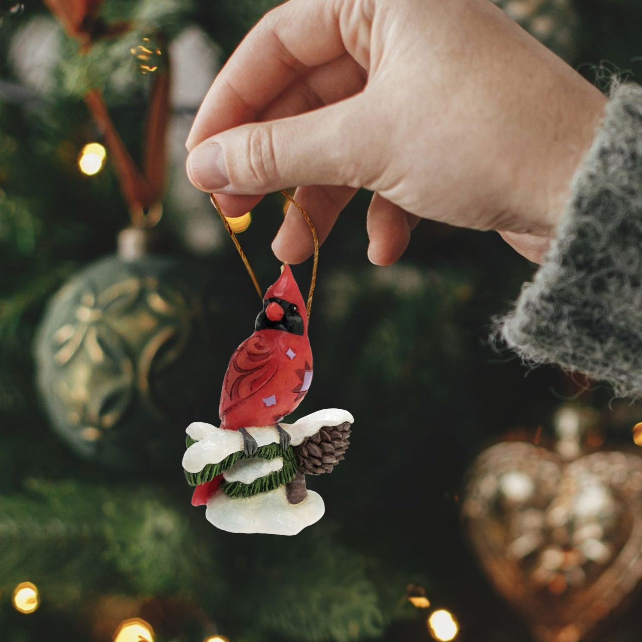 Celebrate Christmas with this beautiful hand crafted and hand painted Carving Cardinal on Snowy Branch Hanging Ornament. Decorate your tree this Christmas with this Carving Cardinal on Snowy Branch Hanging Ornament.
