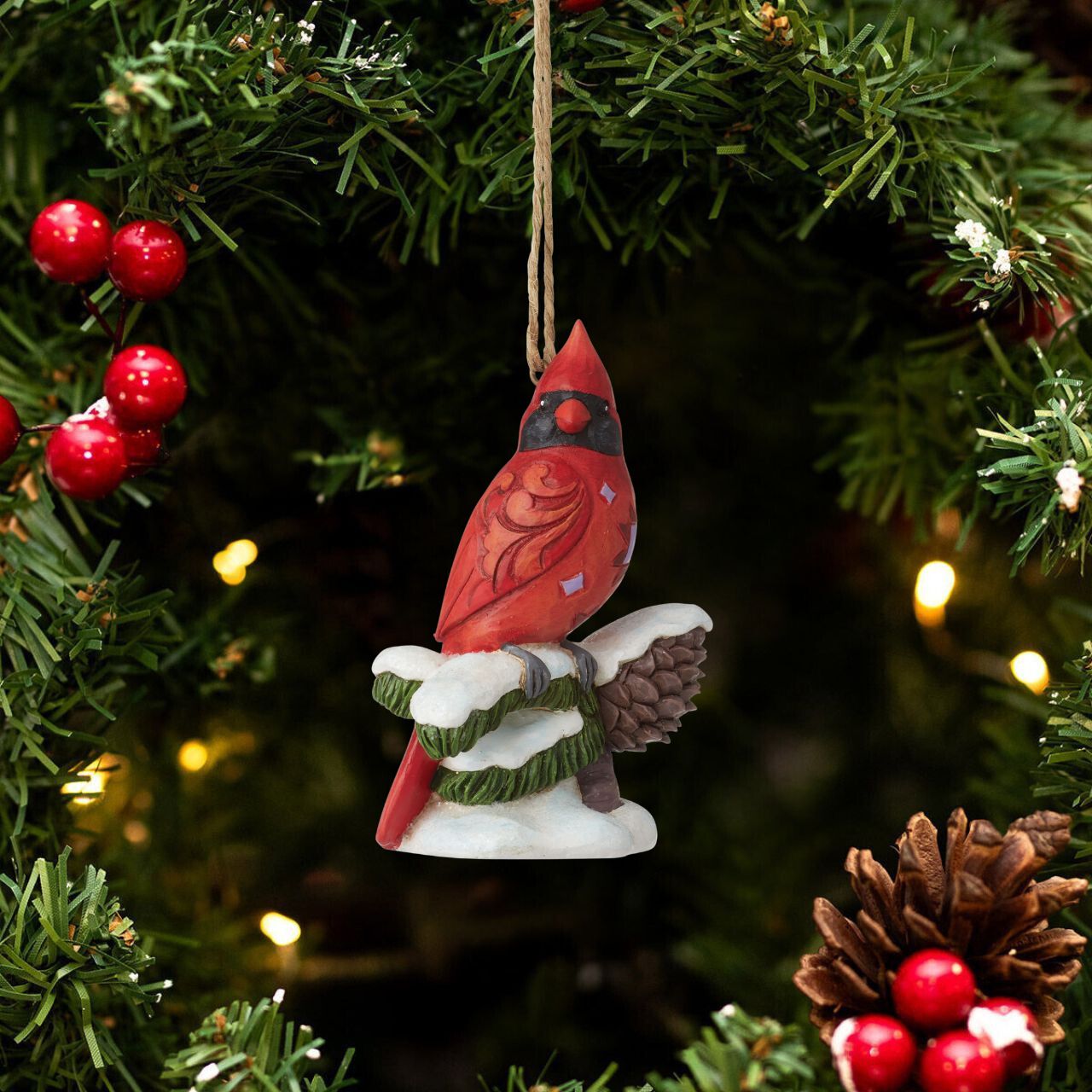 Celebrate Christmas with this beautiful hand crafted and hand painted Carving Cardinal on Snowy Branch Hanging Ornament. Decorate your tree this Christmas with this Carving Cardinal on Snowy Branch Hanging Ornament.