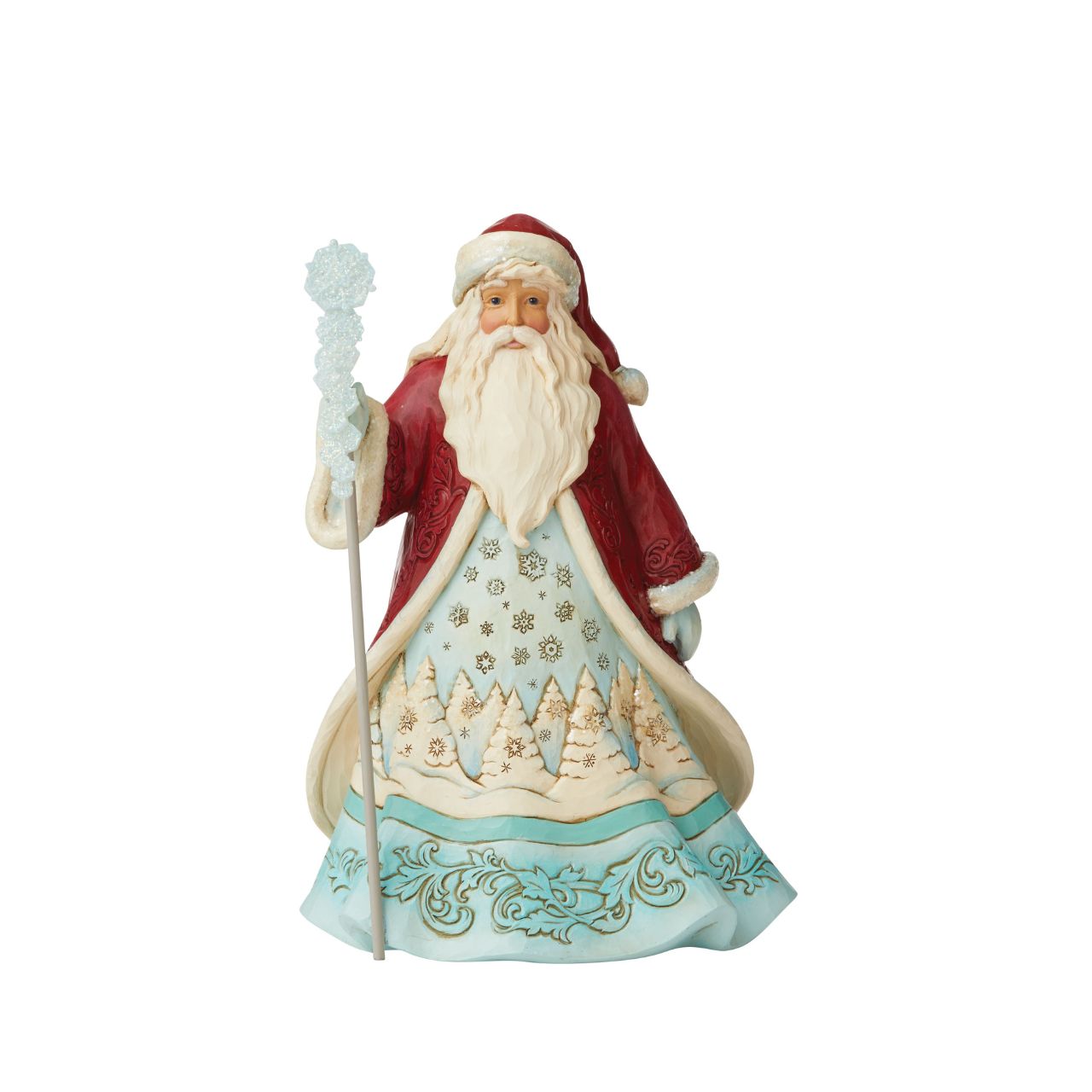"Ice and Snow Can Warm The Soul" This icey Santa has been designed by Jim Shore as part of his Winter Wonderland collection. His staff is topped by an acrylic snowflake to add to the feeling of snow and ice before added embellishments of glitter are added.