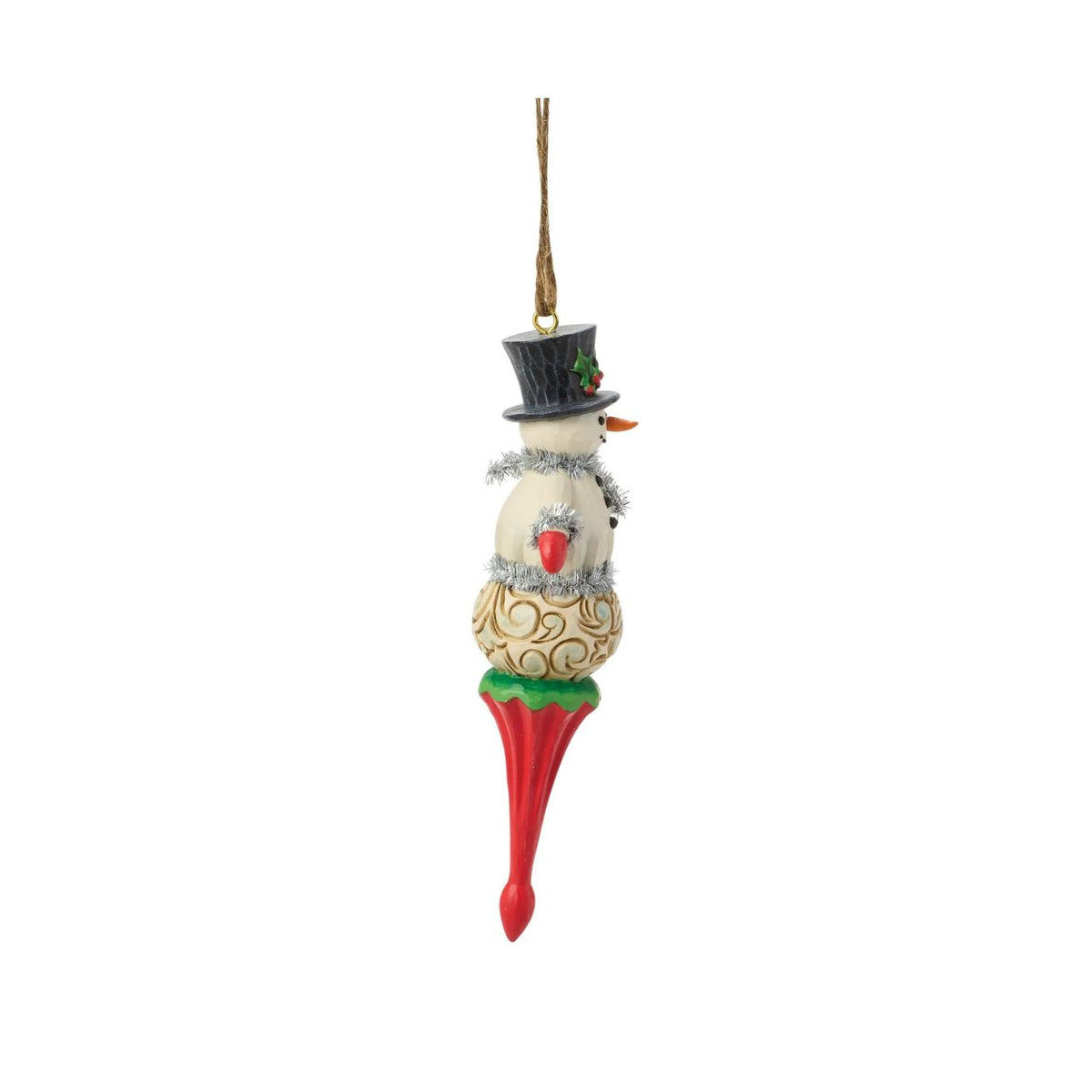 Capture the magic of Christmas with this delightful Snowman Figurine from Heartwood Creek by Jim Shore. This exquisitely crafted piece combines Jim Shore's unmistakable folk-art style with the timeless appeal of a festive snowman.