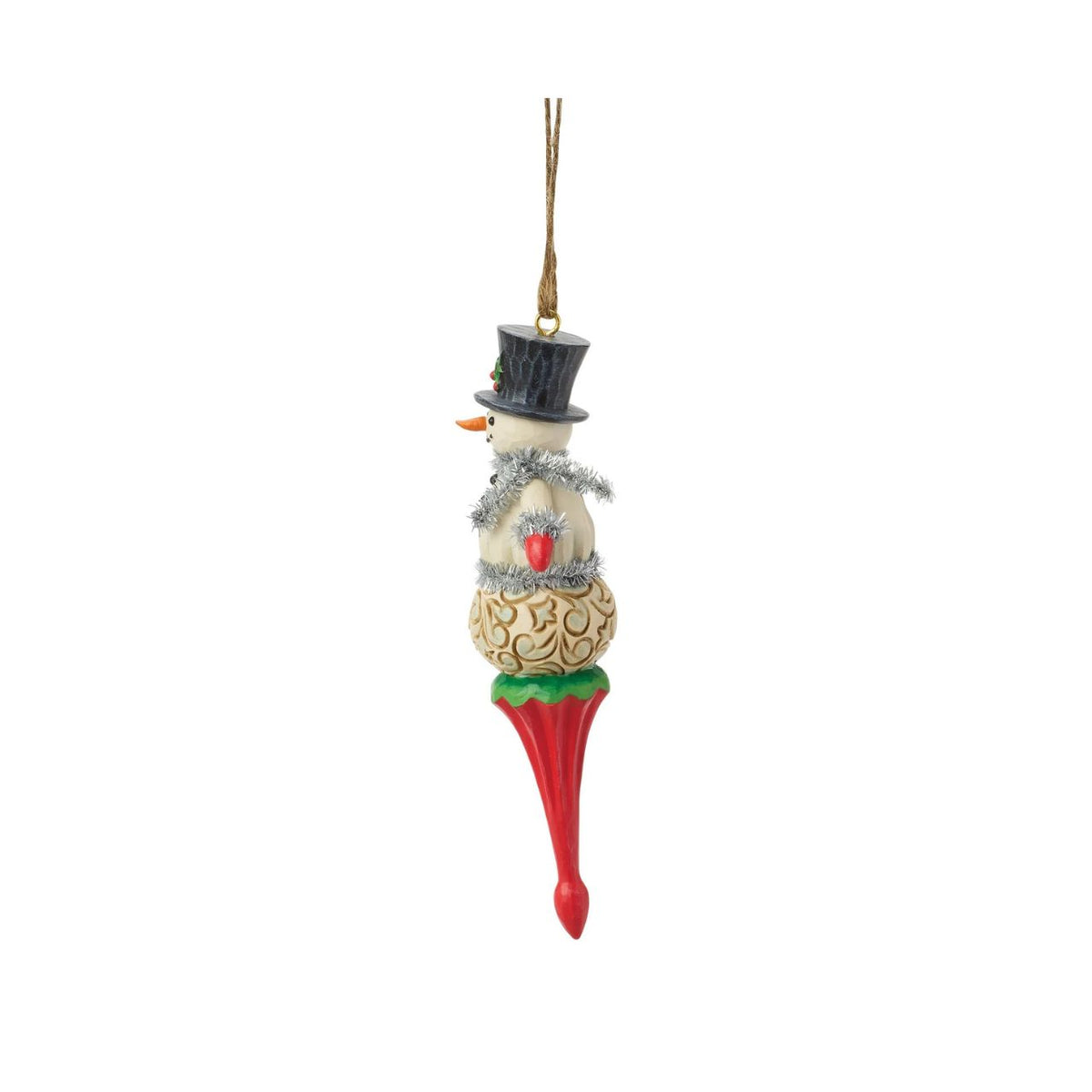 Capture the magic of Christmas with this delightful Snowman Figurine from Heartwood Creek by Jim Shore. This exquisitely crafted piece combines Jim Shore's unmistakable folk-art style with the timeless appeal of a festive snowman.