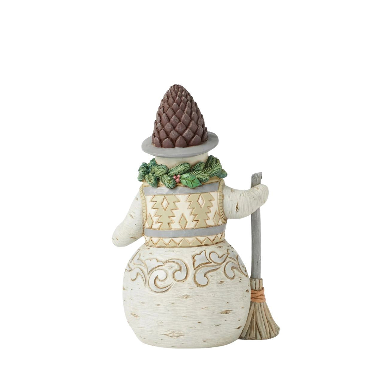 This cheerful Jim Shore designed snowman carrying a broomstick, sure is exuding charm with a wreath wrapped around his neck as a scarf and a pinecone hat. His delightful details capture the beauty of winter and the joy of the season.