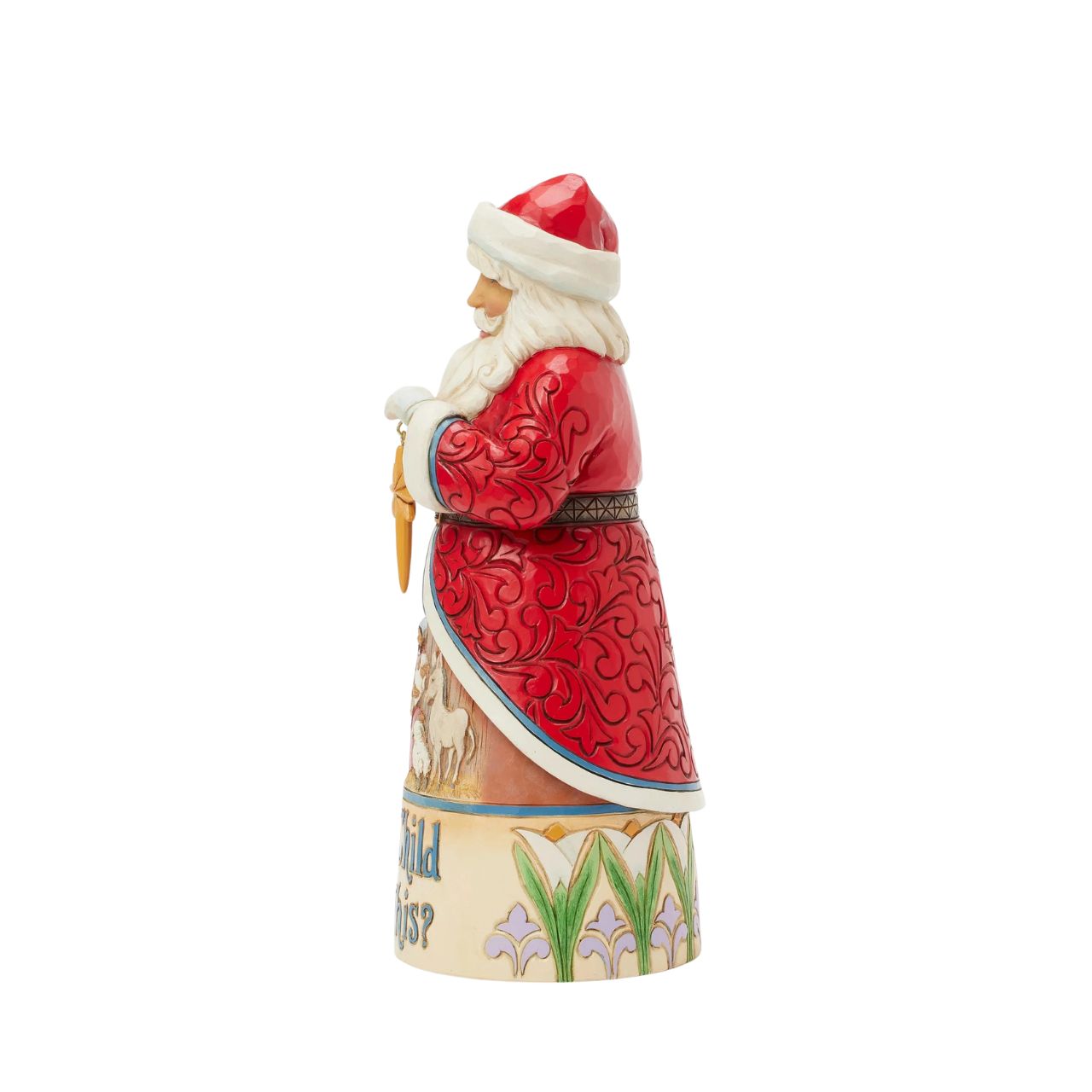 From the Santa Song Series this enchanting Jim Shore Santa beams as he holds the Christmas star, his intricate cloak parting to reveal a serene manger scene of Mary and Jesus with animals. Scripted "What Child is This,