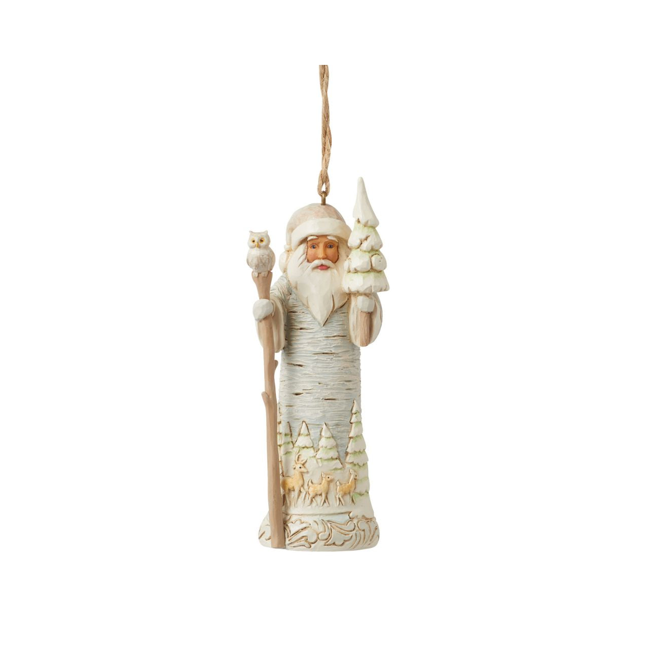 From the White Woodland collection as part of Heartwood Creek by Jim Shore, this Santa hanging ornament is created to look like he is carved from silver birch wood, a fun and creative way to bring the outside in this Christmas.