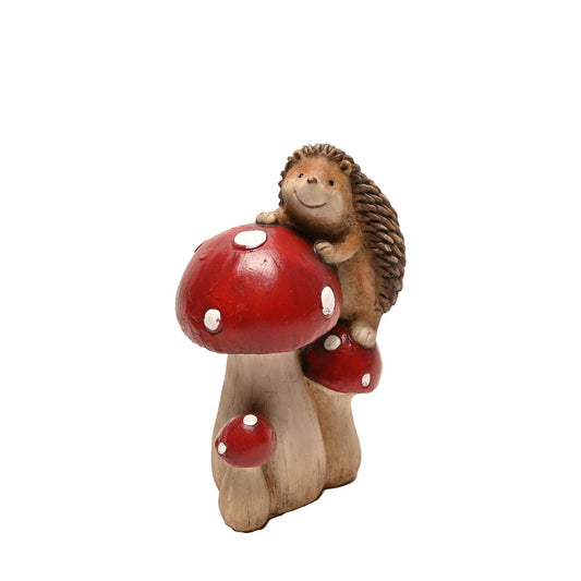 Bring some vibrant colour and life to an indoor or outdoor space with this charming hand painted hedgehog climbing mushrooms figurine by COUNTRY LIVING. Country Living - gift and home bringing you closer to the great outdoors.