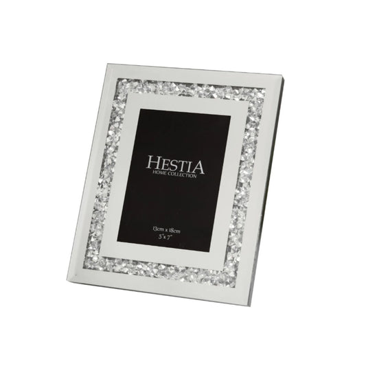 An elegant 5" x 7" aperture photo frame with mirrored glass and crystal edge detail. This beautiful frame is the perfect way to compliment a treasured photograph with glamorous and eye-catching style.