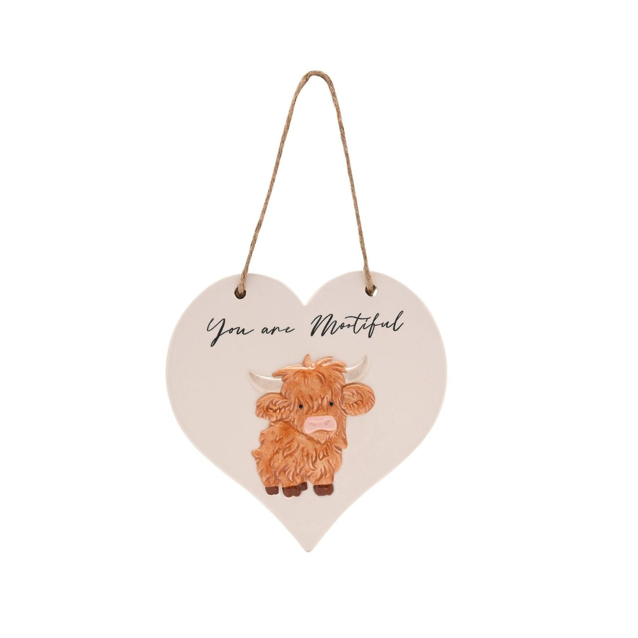 This charming ceramic plaque showcases a whimsical highland cow illustration and the playful message “You are Mootiful”. Shaped like a heart and finished with a rustic rope hanger, it’s cosy design make it a lovely addition to any home.